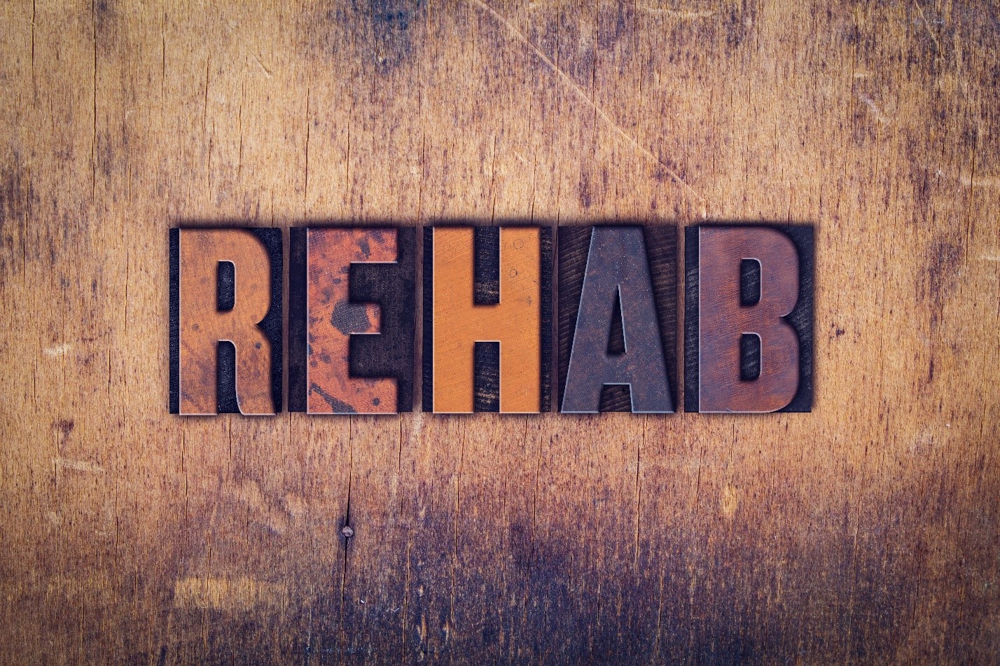 Rehab Sign On Wood