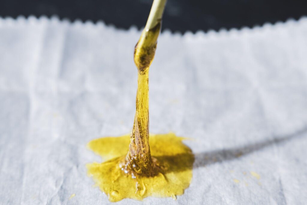 thc concentrate resin being vertically stretched with dab tool